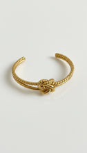 Load image into Gallery viewer, Gold Stainless Steel Knot Cuff Bracelet | Modern Minimalist Jewelry
